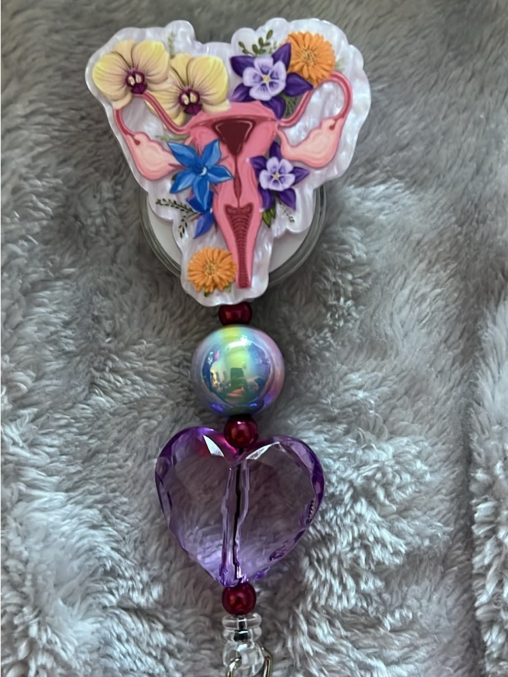 Uterus Floral Badge Reel with Purple Heart Charm
